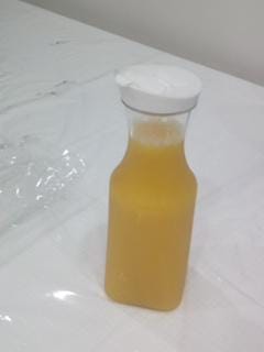 clear plastic round juice pitchers