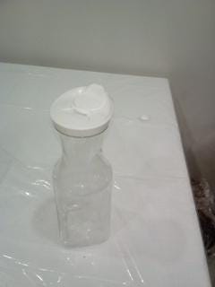 clear plastic round juice pitchers
