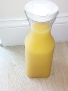 clear plastic round juice pitchers