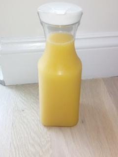 clear plastic round juice pitchers